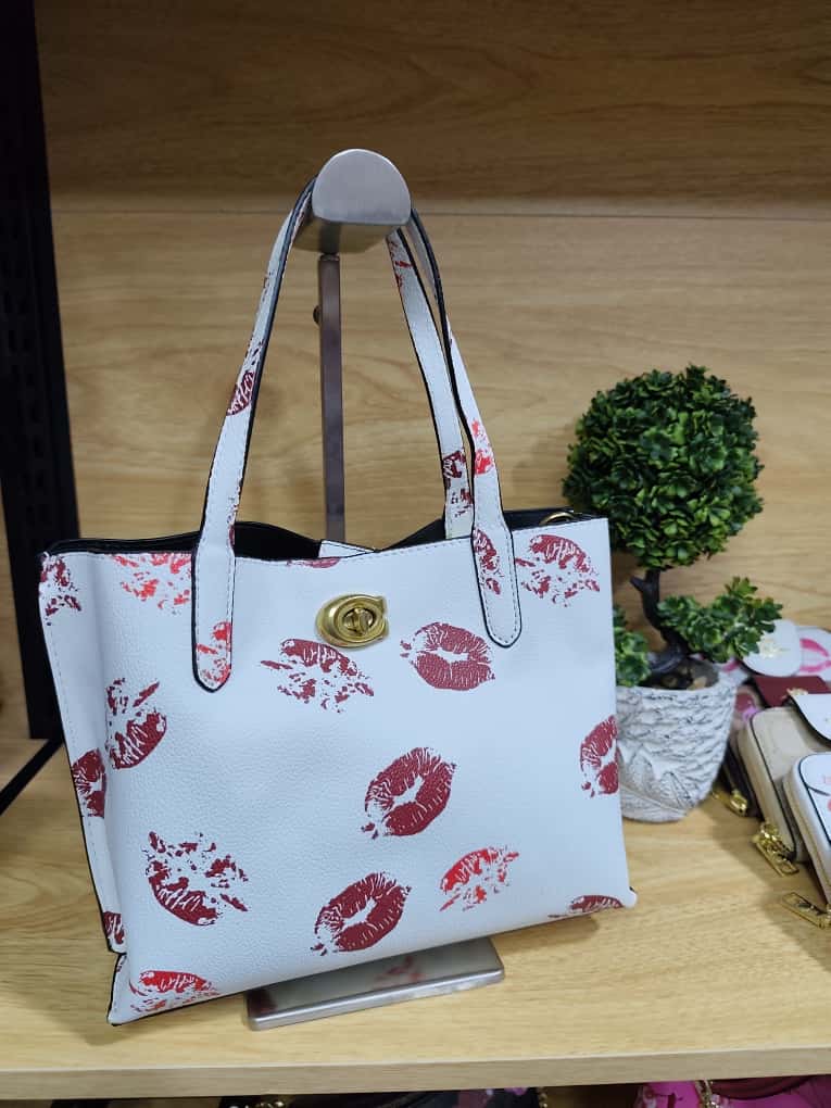 Cartera Coach
